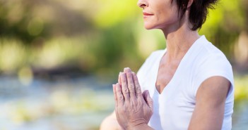 middle age woman doing yoga meditation